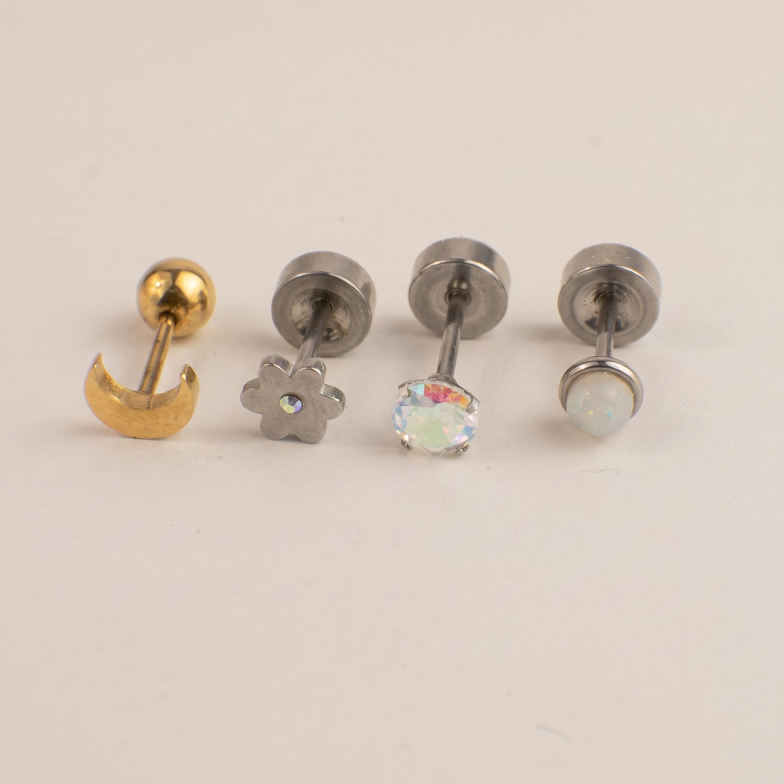 Combo Oreja Calavera Dorado & Gema Iridiscente