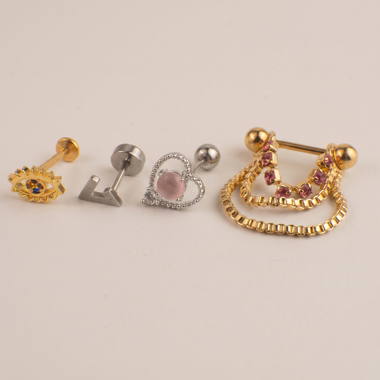 Stack de Oreja Dorado Rojo Rosa + Corazon Rosa Dije